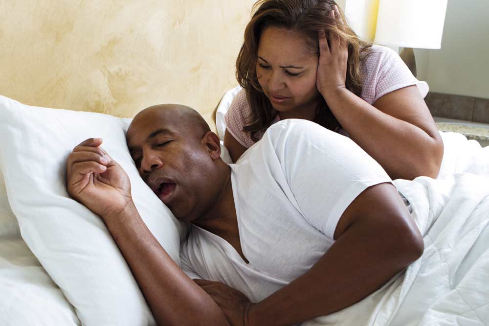 Woman upset with partner snoring